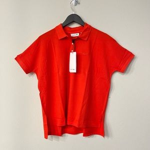 Lacoste Women's Relax Fit Flowing Stretch Cotton Piqué Soft Polo, Red Orange
